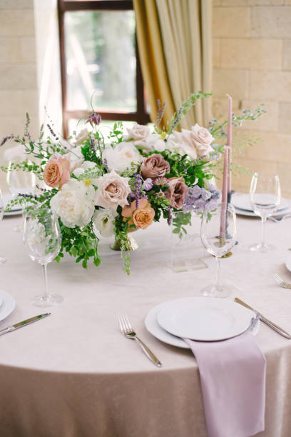 istock Table setting at a luxury wedding and Beautiful flowers on the table. 1220817299