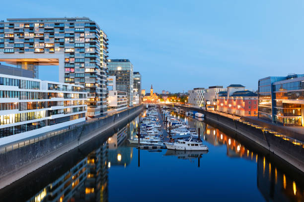 istock Crane Buildings and Marina at night, Cologne, Germany 1220817440