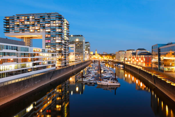 istock Crane Buildings and Marina at night, Cologne, Germany 1220818300