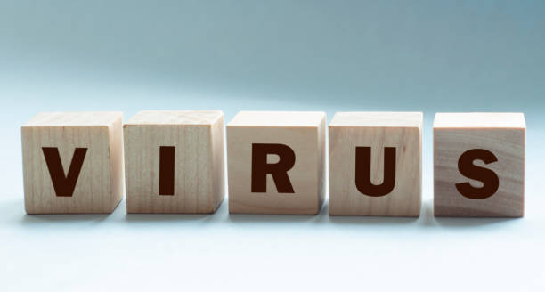 istock word VIRUS on wood cubes, corona virus covid-19 outbreak warning concept 1220821827