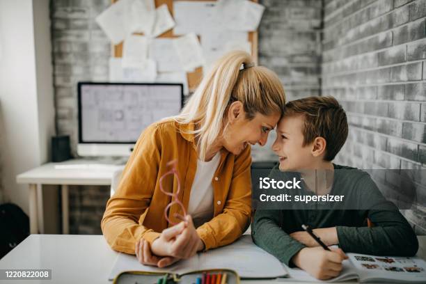 mom-and-son-working-during-lockdown-stock-photo-download-image-now