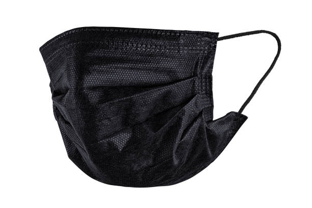 istock Black medical face mask half turn view isolated with clipping path 1220822385