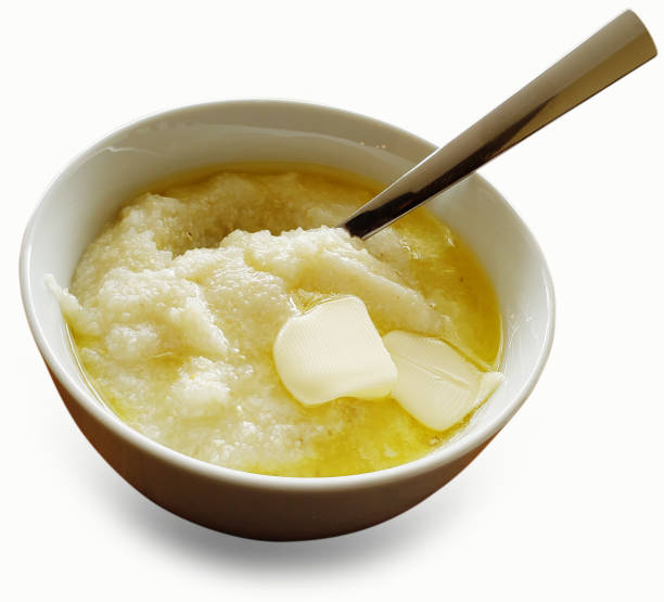 istock Bowl of Buttery Grits with Clipping Path Over White 1220822400