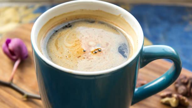 istock A cup of aromatic coffee stands on a wooden table. 1220824219