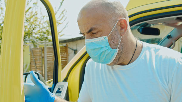 istock Paramedic leaving ambulance 1220829278