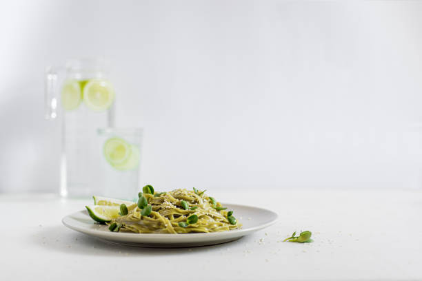 istock Green pasta with microgreens and seeds 1220831343