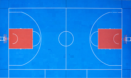 view on blue basketball court from drone
