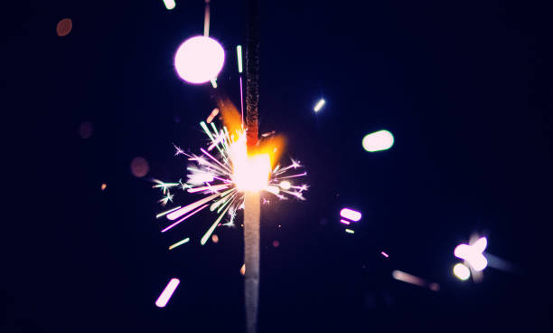 istock Sparks in the dark. Sparks. Christmas and New Year time. Magic light 1220832781