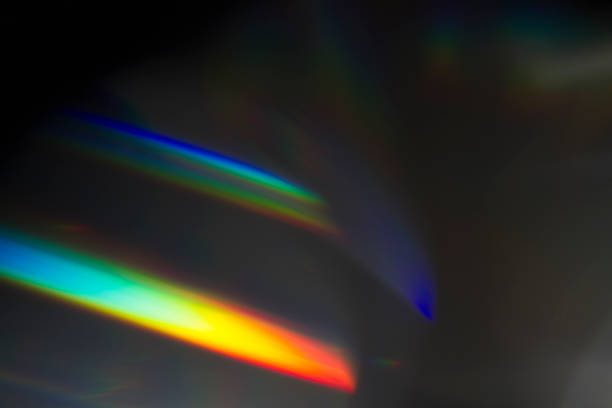Light leak on black background Sun reflection over a piece of crystal for a colorful lens flare on black background crystal photos stock pictures, royalty-free photos & images