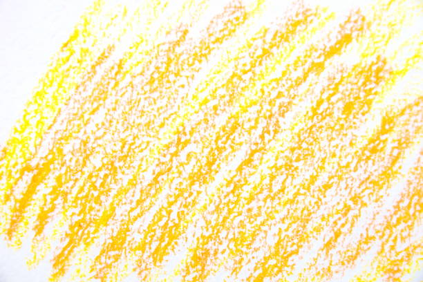 istock Yellow oil pastel abstract doodle drawing on paper, on white background 1220833482