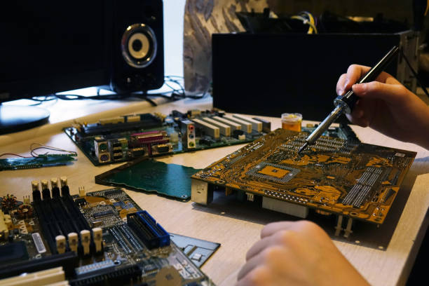 istock Repair of electronic devices and printed circuit boards. 1220838371