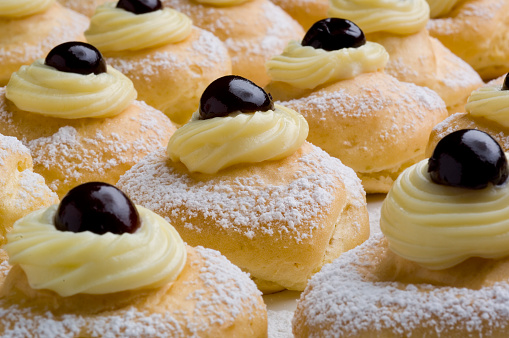 Zeppola, it is traditional dough ball shape Italian pastry, also known as Saint Joseph's day cake.