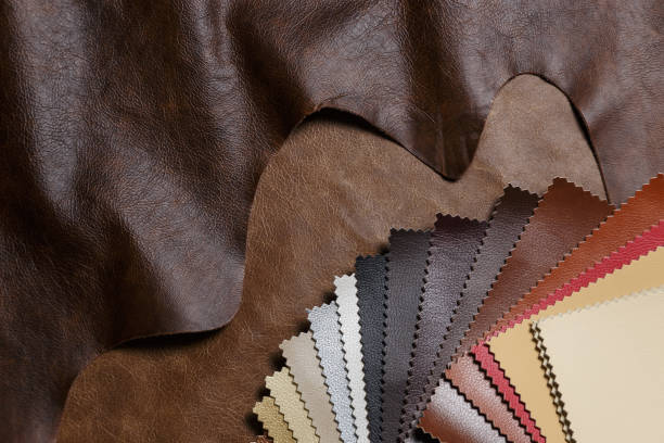 The composition of leather samples on a natural cow leather. Top view