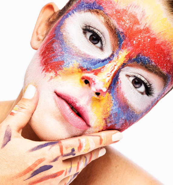 istock Close-up woman with artistic colorful make-up 1220842061
