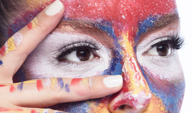 istock Close-up woman with artistic colorful make-up 1220842218