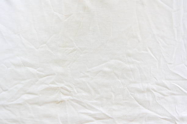 istock Crumpled white linen fabric cotton for wallpaper design 1220844948