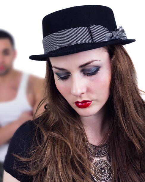 Angry couple stops look at each other. White background