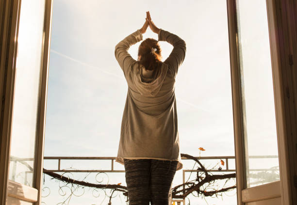 istock Mid age woman workout yoga at balcony 1220847770