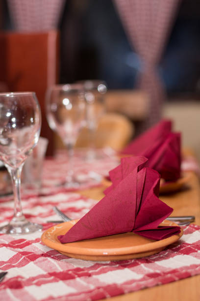 istock Glasses napkin and silver utensils on the tavern table 1220850018