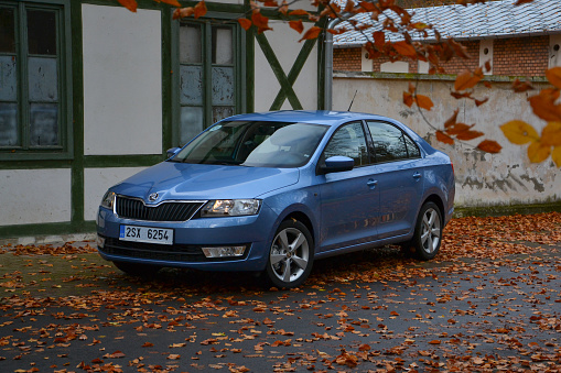 Poznan, Poland - 6th November 2012. Skoda Rapid (2012-2019) parked on a street. This model was a popular liftback vehicle in Europe.