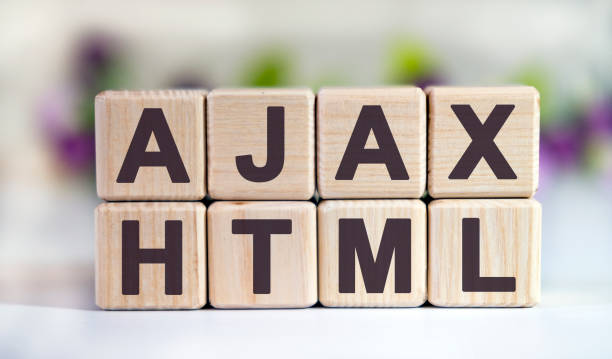 AJAX HTML - text on wooden cubes on a floral background with tulip buds AJAX HTML - text on wooden cubes on a floral background with tulip buds cascading style sheets photos stock pictures, royalty-free photos & images