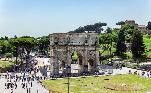 Triumphal Arch of Constantine near Colosseum. View from the Coliseum - Rome, Italy.