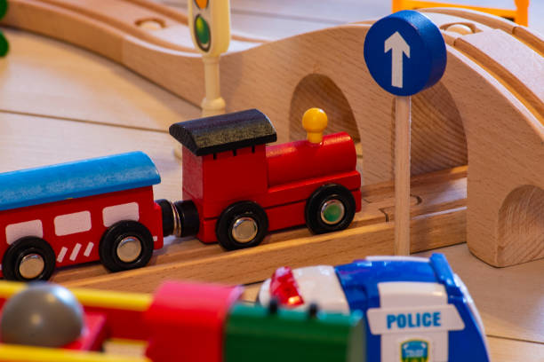 istock wooden toy train and railways 1220856814