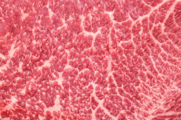Fresh marbled beef steak Fresh marbled beef steak Isolated on a white background, macro shot, top view marbled meat stock pictures, royalty-free photos & images