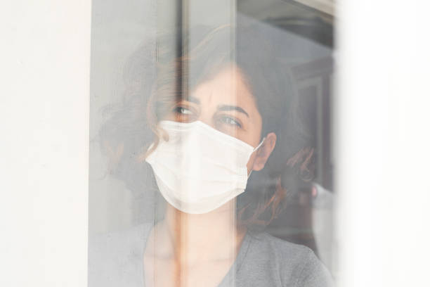 istock Woman in Isolation Quarantine Coronavirus 1220859638