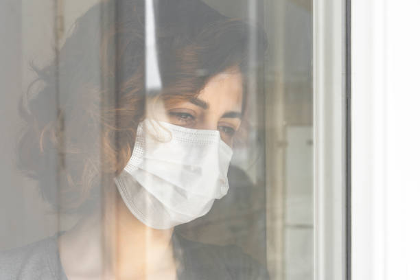 istock Woman in Isolation Quarantine Coronavirus 1220860417