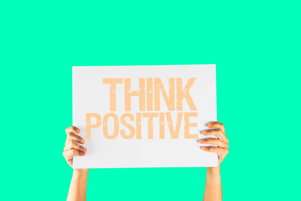 istock Hands holding a white placard with the message safety first on an isolated color background 1220864123