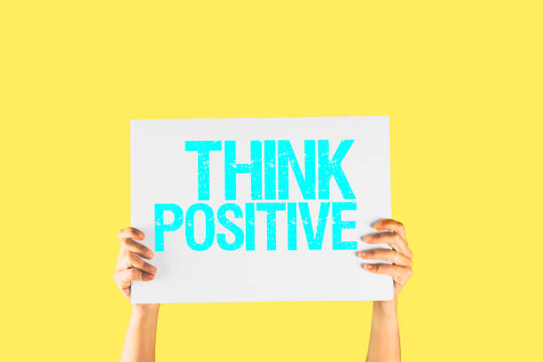 istock Hands holding a white placard with the message safety first on an isolated color background 1220864124