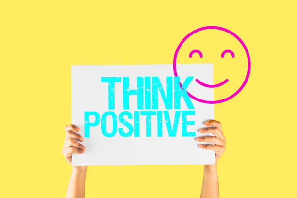 istock Hands holding a white placard with the message safety first on an isolated color background 1220864126