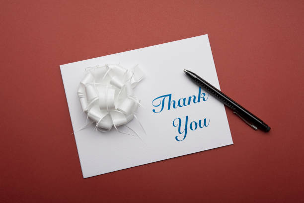 istock Envelope with Thank You Message and white ornament. 1220865061