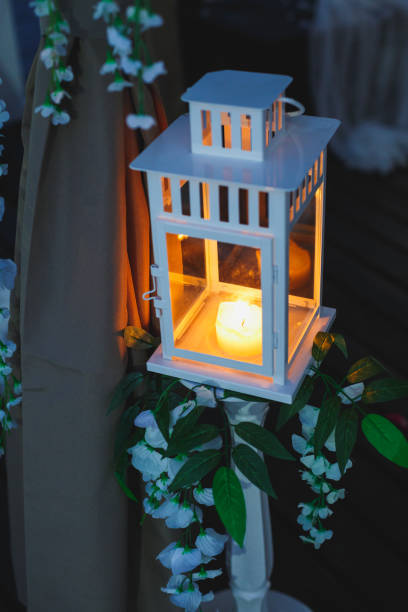 istock Beautiful white candlestick with candles inside 1220866297