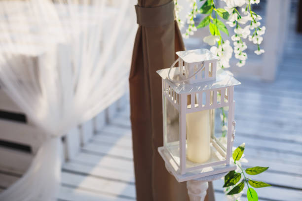 istock Beautiful white candlestick with a candle, outdoor 1220866337