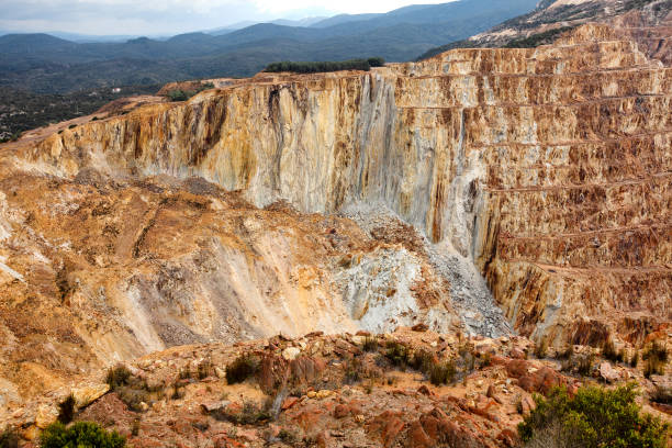 istock Aerial view of sections of open cut mining pit 1220868788