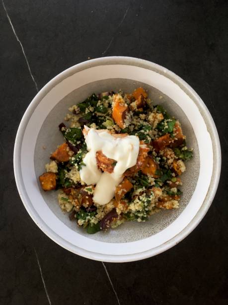 istock Couscous with roasted vegetables, vegan chicken and citrus yogurt dressing 1220872454
