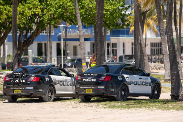 Miami Beach, FL, USA - April 22, 2020: Miami Beach police enforcing social distancing