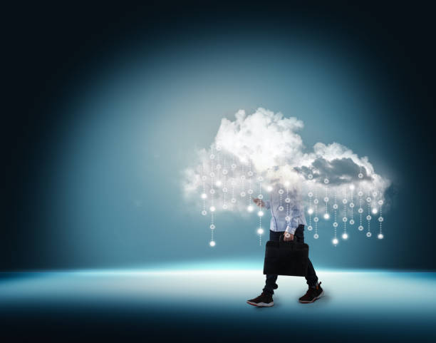 istock Businessman with cloud inside a cloud on blue futuristic background . Big data transfer and artificial intelligence storage 1220889295