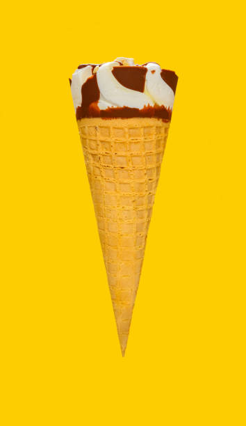istock side view fresh vanilla flaovr ice cream cone with chocolate on a yellow background 1220889388
