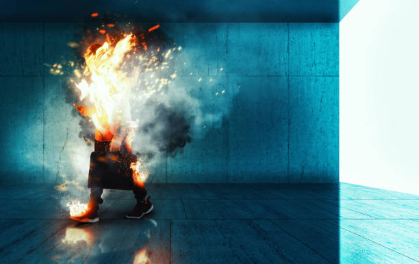 istock Burning businessman going to work . Life insurance concept . Work assurance . Careless worker going to work while on fire . 1220889450
