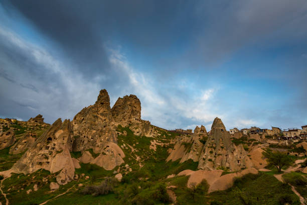 istock Beautiful sandstone rock formations in Cappadocia, Goreme, Turkey, under dramatic stormy sky 1220899744