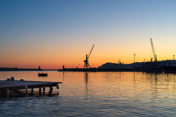 istock Contrasting color over the evening harbour 1220900615