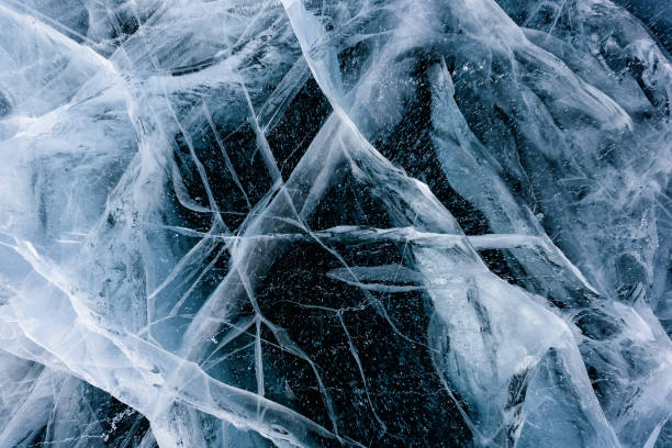 istock Beautiful ice of Lake Baikal with abstract cracks 1220901447