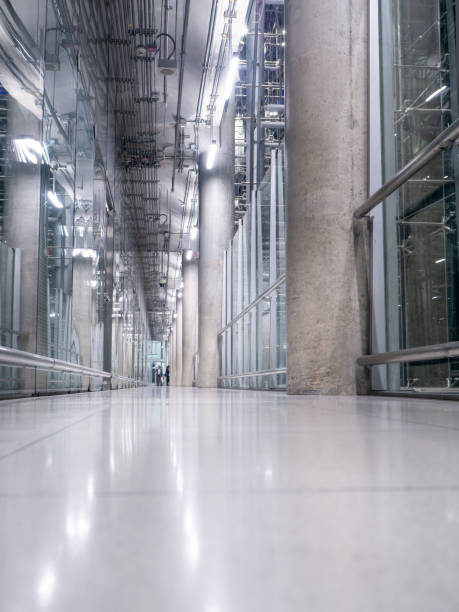 istock big windows passing daylight inside office building on modern glass building interior corridor 1220903221