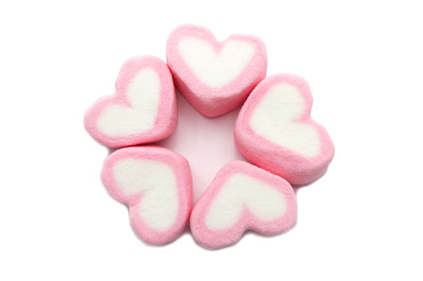 istock Pink sweet heart shape marshmallow isolated on white background. 1220904055