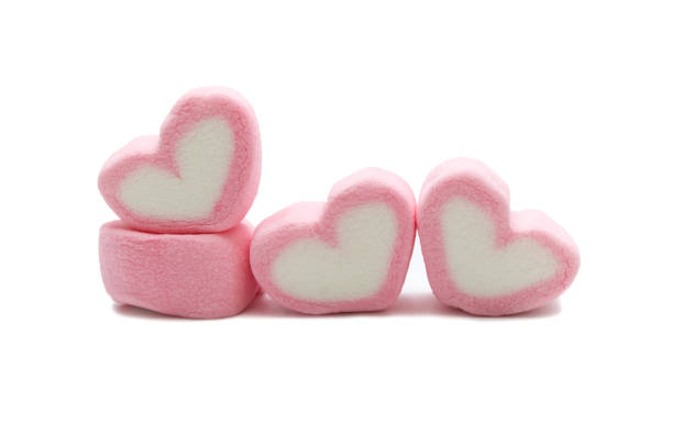 istock Pink sweet heart shape marshmallow isolated on white background. 1220904066