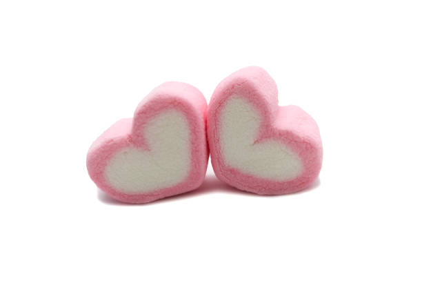 istock Pink sweet heart shape marshmallow isolated on white background. 1220904067