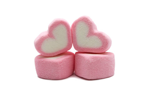 istock Pink sweet heart shape marshmallow isolated on white background. 1220904077